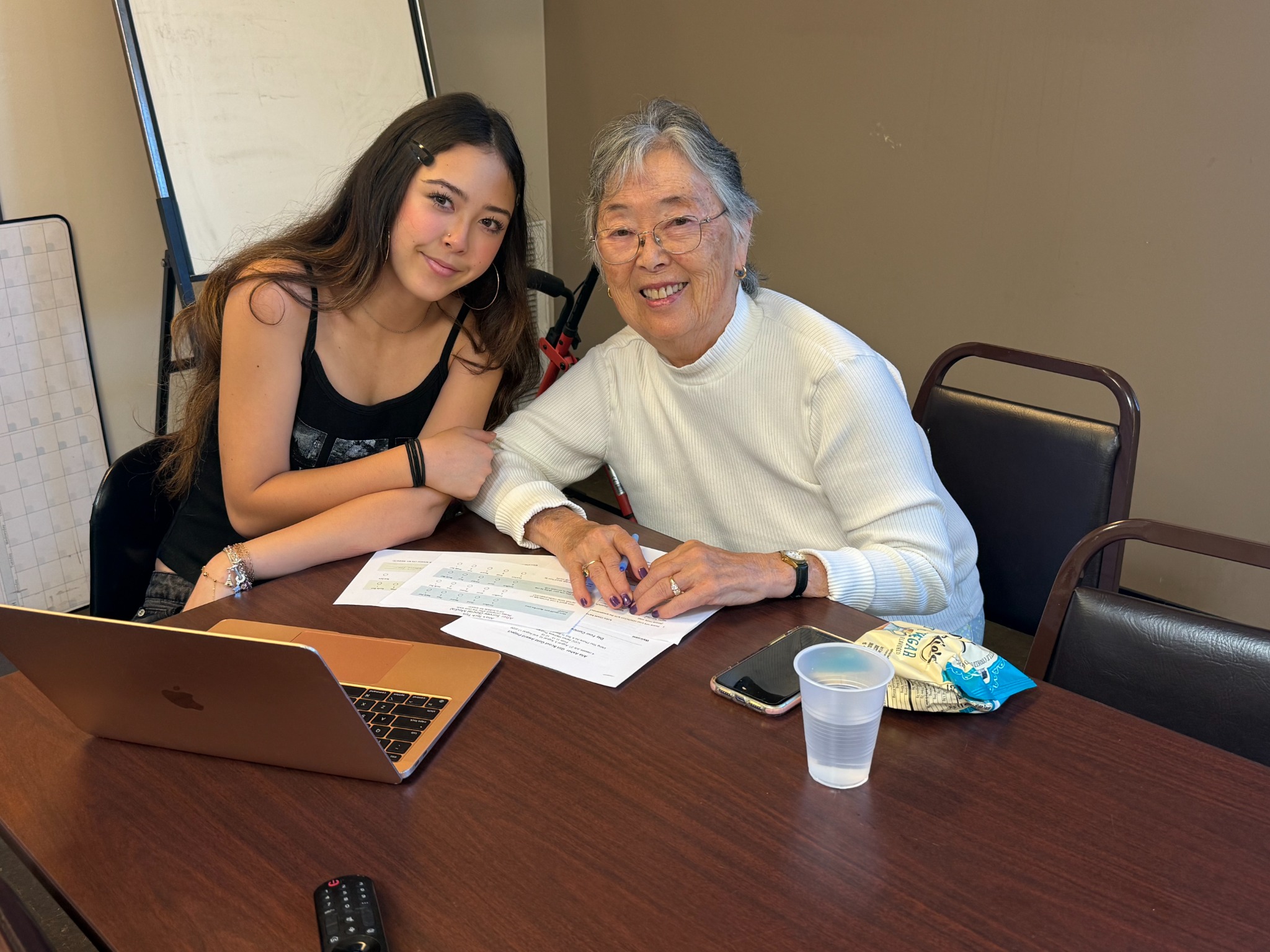 Alia with a senior participant
